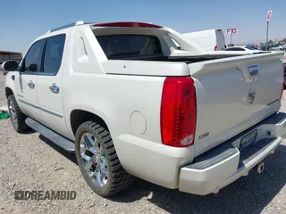 2011 Cadillac Escalade EXT Luxury with VIN 3GYT4MEF6BG161175, listed as a IAAI auction lot 42047669 with 115,235 mi miles. Bid and sale history available at carsss.com. Image 3.