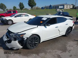 2017 Nissan Maxima Platinum with VIN 1N4AA6AP2HC435795, listed as a IAAI auction lot 42212200 with 109,784 mi miles and . Bid and sale history available at DreamBid. Image 2.