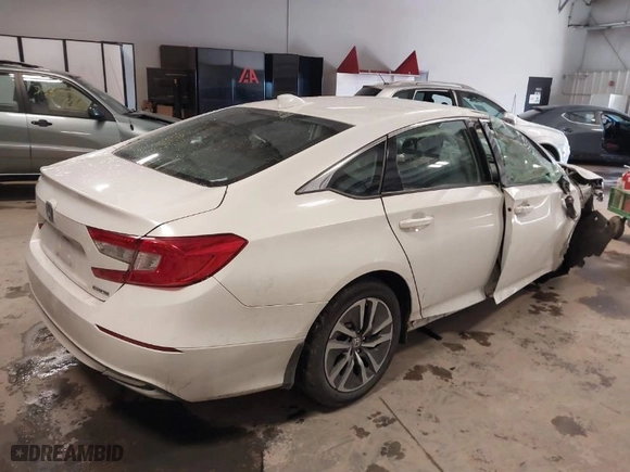 2021 Honda Accord Hybrid with VIN 1HGCV3F17MA022692, listed as a IAAI auction lot 41318681 with 76,467 mi miles. Bid and sale history available at carsss.com. Image 4.