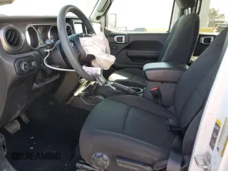 2023 Jeep Wrangler Sport S with VIN 1C4HJXDNXPW596370, listed as a Copart auction lot 48367785 with 37,325 mi miles and Salvage Title. Bid and sale history available at DreamBid. Image 7.