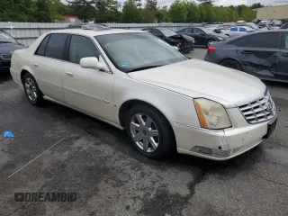 2007 Cadillac DTS V8 z VIN 1G6KD57Y57U215417, wystawiony jako Copart lot #57962455 z przebiegiem 87 592 mil mil oraz Tytuł czysty. Historia ofert i sprzedaży dostępna na DreamBid. Obrazek 4.