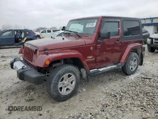 2008 Jeep Wrangler Sahara z VIN 1J4FA54128L561392, wystawiony jako Copart lot #50216865 z przebiegiem 183 825 mil mil oraz Czysty tytuł • Clean title. Historia ofert i sprzedaży dostępna na DreamBid. Obrazek 1.