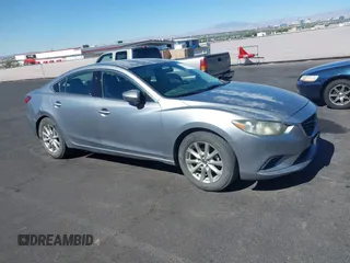 2014 Mazda 6 i Sport with VIN JM1GJ1U61E1151348, listed as a IAAI auction lot 42248173 with 275,764 mi miles and . Bid and sale history available at DreamBid. Image 1.