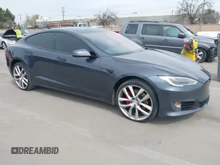 2016 Tesla Model S 90D with VIN 5YJSA1E40GF172502, listed as a IAAI auction lot 41841406 with 83,660 mi miles and . Bid and sale history available at DreamBid. Image 1.