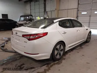 2012 Kia Optima Hybrid with VIN KNAGM4AD5C5023886, listed as a IAAI auction lot 41564218 with 124,305 mi miles. Bid and sale history available at carsss.com. Image 4.