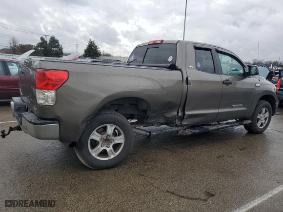 2011 Toyota Tundra 4WD Truck with VIN 5TFUY5F10BX161708, listed as a Copart auction lot 87011954 with 122,825 mi miles and Salvage Title. Bid and sale history available at carsss.com. Image 3.