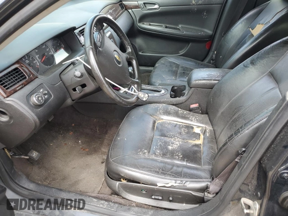 2014 Chevrolet Impala LTZ with VIN 2G1WC5E36E1147252, listed as a Copart auction lot 59480795 with 158,609 mi miles and Salvage title. Bid and sale history available at DreamBid. Image 7.