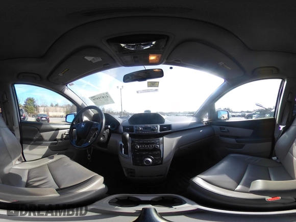 2012 Honda Odyssey Touring with VIN 5FNRL5H95CB063003, listed as a IAAI auction lot 41871975 with 179,332 mi miles and . Bid and sale history available at DreamBid. Image 18.