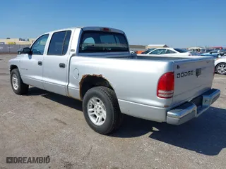 2001 Dodge Dakota Sport with VIN 1B7GL2AN91S196862, listed as a IAAI auction lot 41963118 with 233,150 mi miles. Bid and sale history available at carsss.com. Image 3.
