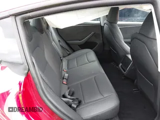 2024 Tesla Model 3 Long Range with VIN 5YJ3E1EB5RF733965, listed as a IAAI auction lot 41613919 with 11,570 mi miles and . Bid and sale history available at DreamBid. Image 8.