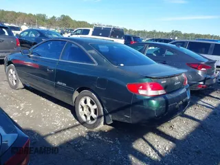 1999 Toyota Solara SE with VIN 2T1CF22P2XC152976, listed as a IAAI auction lot 41316334 with 240,623 mi miles. Bid and sale history available at carsss.com. Image 3.