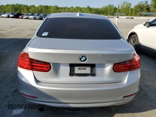 2014 BMW 3 Series 320i with VIN WBA3B1C56EK135528, listed as a Copart auction lot 53075575 with 131,341 mi miles and Salvage Title. Bid and sale history available at carsss.com. Image 6.