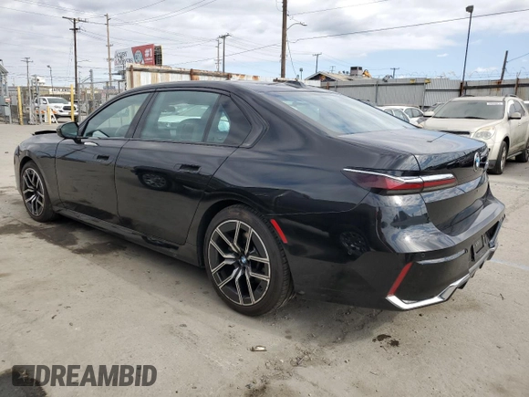 2024 BMW 7 Series 740i with VIN WBA23EH03RCP67206, listed as a Copart auction lot 54631285 with 22,901 mi miles and Salvage title. Bid and sale history available at DreamBid. Image 2.