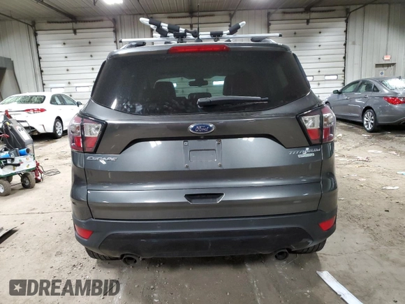 2017 Ford Escape Titanium with VIN 1FMCU0JD4HUE22551, listed as a Copart auction lot 55152455 with 115,653 mi miles and Clean Title. Bid and sale history available at carsss.com. Image 6.