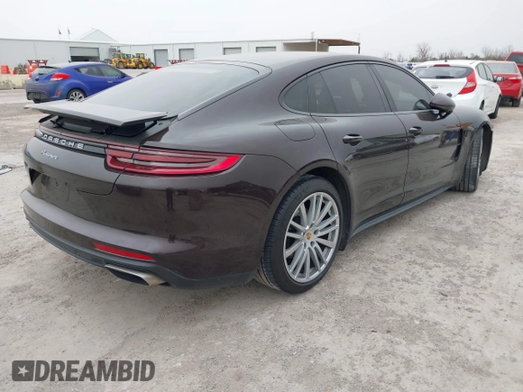 2019 Porsche Panamera with VIN WP0AA2A76KL100288, listed as a IAAI auction lot 41741039 with 76,834 mi miles and . Bid and sale history available at DreamBid. Image 4.