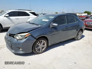 2014 Toyota Corolla L with VIN 2T1BURHE9EC135735, listed as a Copart auction lot 65410135 with 216,402 mi miles and Clean title. Bid and sale history available at DreamBid. Image 1.