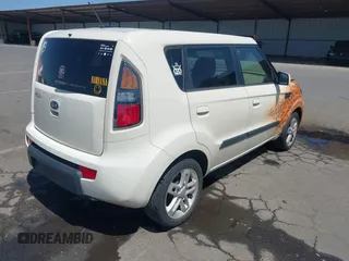 2010 Kia Soul + with VIN KNDJT2A28A7078333, listed as a IAAI auction lot 42097259 with 165,243 mi miles. Bid and sale history available at carsss.com. Image 4.