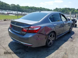 2016 Honda Accord Touring with VIN 1HGCR3F94GA009459, listed as a IAAI auction lot 42597128 with 182,977 mi miles and . Bid and sale history available at DreamBid. Image 4.