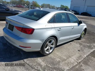 2015 Audi A3 Premium z VIN WAUACGFFXF1005724, wystawiony jako IAAI lot #41745687 z przebiegiem 109 751 mil mil oraz . Historia ofert i sprzedaży dostępna na DreamBid. Obrazek 4.