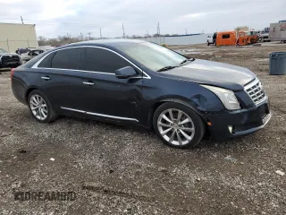 2013 Cadillac XTS Luxury with VIN 2G61P5S31D9176445, listed as a Copart auction lot 45313215 with 87,560 mi miles and Salvage title. Bid and sale history available at DreamBid. Image 4.