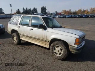 1994 Ford Explorer Eddie Bauer z VIN 1FMDU34X4RUE80513, wystawiony jako Copart lot #80094394 z przebiegiem 293 609 mil mil oraz Szkoda całkowita • Salvage title. Historia ofert i sprzedaży dostępna na DreamBid. Obrazek 4.