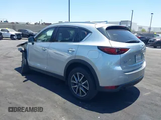 2018 Mazda CX-5 Grand Touring with VIN JM3KFBDM3J0343782, listed as a IAAI auction lot 42527044 with 60,180 mi miles and . Bid and sale history available at DreamBid. Image 3.