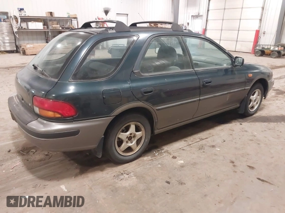 1996 Subaru Impreza Outback Special Sports with VIN JF1GF4858TH810489, listed as a IAAI auction lot 41361018 with 204,924 mi miles and . Bid and sale history available at DreamBid. Image 4.