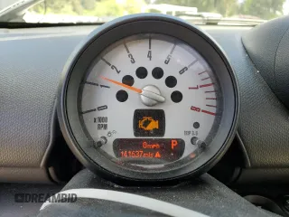 2013 MINI Countryman S ALL4 z VIN WMWZC5C56DWP33270, wystawiony jako Copart lot #56804085 z przebiegiem 141 637 mil mil oraz Szkoda całkowita • Salvage title. Historia ofert i sprzedaży dostępna na DreamBid. Obrazek 9.