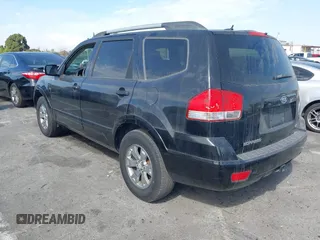2009 Kia Borrego LX with VIN KNDJJ741095039023, listed as a IAAI auction lot 41696562 with 239,921 mi miles. Bid and sale history available at carsss.com. Image 3.
