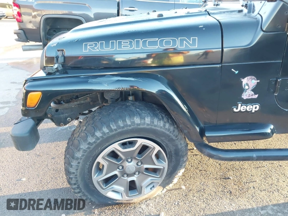 1997 Jeep Wrangler SE with VIN 1J4FY29P0VP415195, listed as a IAAI auction lot 41221078 with 137,046 mi miles. Bid and sale history available at carsss.com. Image 13.