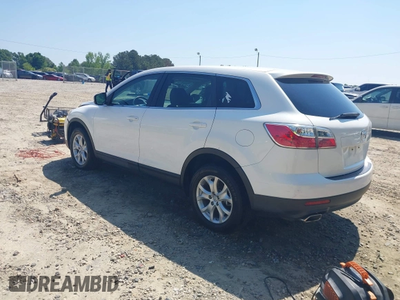 2011 Mazda CX-9 Sport with VIN JM3TB2BA7B0304087, listed as a IAAI auction lot 42138663 with 186,964 mi miles and . Bid and sale history available at DreamBid. Image 3.