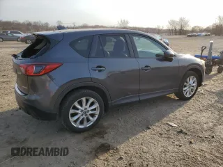 2014 Mazda CX-5 Grand Touring with VIN JM3KE4DY5E0372787, listed as a Copart auction lot 48873675 with 136,784 mi miles and Salvage Title. Bid and sale history available at carsss.com. Image 3.