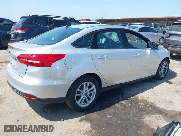 2017 Ford Focus SE with VIN 1FADP3F2XHL256136, listed as a IAAI auction lot 42215479 with 89,945 mi miles and . Bid and sale history available at DreamBid. Image 4.