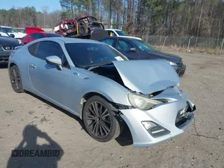 2013 Scion FR-S with VIN JF1ZNAA18D2732222, listed as a IAAI auction lot 41453887 with 145,063 mi miles. Bid and sale history available at carsss.com. Image 1.