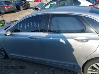 2017 Lincoln MKZ Select z VIN 3LN6L5D96HR663197, wystawiony jako IAAI lot #42280513 z przebiegiem 76 578 mil mil oraz . Historia ofert i sprzedaży dostępna na DreamBid. Obrazek 15.