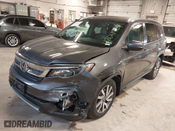 2019 Honda Pilot EX-L with VIN 5FNYF6H50KB035548, listed as a IAAI auction lot 42011724 with 105,195 mi miles and . Bid and sale history available at DreamBid. Image 6.