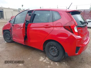 2017 Honda Fit LX z VIN 3HGGK5H58HM705063, wystawiony jako IAAI lot #41962906 z przebiegiem 163 835 mil mil oraz . Historia ofert i sprzedaży dostępna na DreamBid. Obrazek 3.
