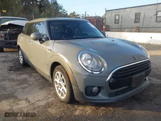 2019 MINI Clubman Cooper with VIN WMWLN5C59K2G82399, listed as a IAAI auction lot 41349514 with 64,235 mi miles. Bid and sale history available at carsss.com. Image 1.