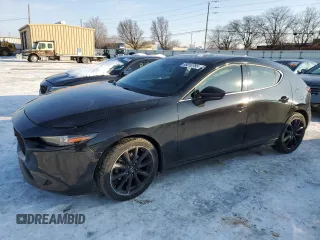 2019 Mazda Mazda3 Hatchback w/Premium Pkg with VIN JM1BPBNM0K1122477, listed as a Copart auction lot 88010785 with 69,270 mi miles and Salvage Title. Bid and sale history available at carsss.com. Image 1.