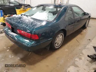 1995 Ford Thunderbird LX with VIN 1FALP62W8SH205542, listed as a Copart auction lot 47741815 with 128,401 mi miles and Clean Title. Bid and sale history available at DreamBid. Image 3.