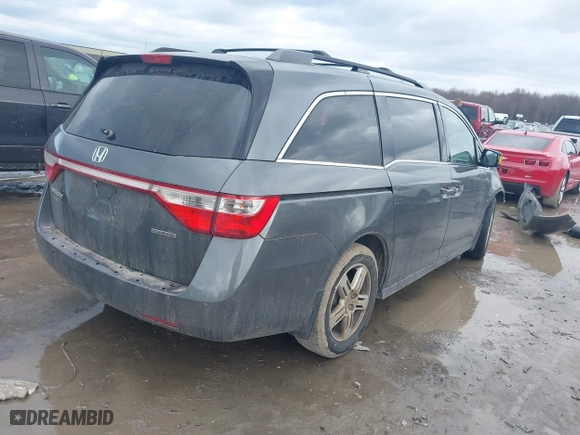 2011 Honda Odyssey Touring with VIN 5FNRL5H95BB007514, listed as a IAAI auction lot 41402516 with 281,032 mi miles. Bid and sale history available at carsss.com. Image 4.