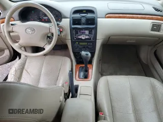 2002 Toyota Solara SE z VIN 2T1CF22P82C547530, wystawiony jako Copart lot #58586165 z przebiegiem 209 267 mil mil oraz Szkoda całkowita • Salvage title. Historia ofert i sprzedaży dostępna na DreamBid. Obrazek 8.