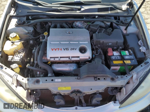 2006 Toyota Camry LE z VIN 4T1BF30KX6U630387, wystawiony jako Copart lot #49624755 z przebiegiem 232 568 mil mil oraz Szkoda całkowita • Salvage title. Historia ofert i sprzedaży dostępna na DreamBid. Obrazek 12.
