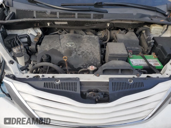 2017 Toyota Sienna LE with VIN 5TDJZ3DCXHS180970, listed as a Copart auction lot 88876535 with 180,318 mi miles and Salvage Title. Bid and sale history available at carsss.com. Image 12.