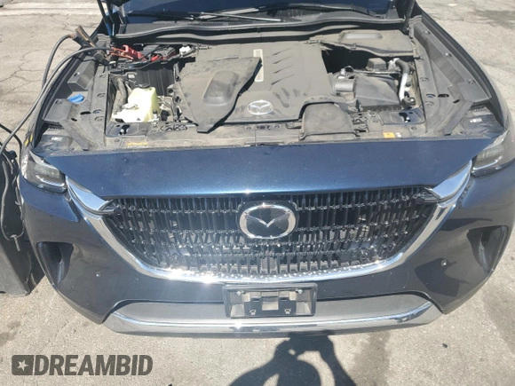 2024 Mazda CX-90 Premium with VIN JM3KKDHA2R1157261, listed as a Copart auction lot 61197825 with 16,682 mi miles and Salvage title. Bid and sale history available at DreamBid. Image 12.