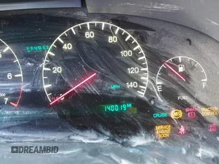 2000 Cadillac DeVille DTS z VIN 1G6KF5793YU222306, wystawiony jako IAAI lot #40810291 z przebiegiem 140 019 mil mil oraz . Historia ofert i sprzedaży dostępna na DreamBid. Obrazek 7.
