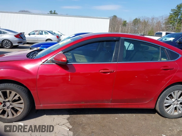 2009 Mazda 6 i Grand Touring with VIN 1YVHP82A495M04111, listed as a IAAI auction lot 42031522 with 251,839 mi miles. Bid and sale history available at carsss.com. Image 15.