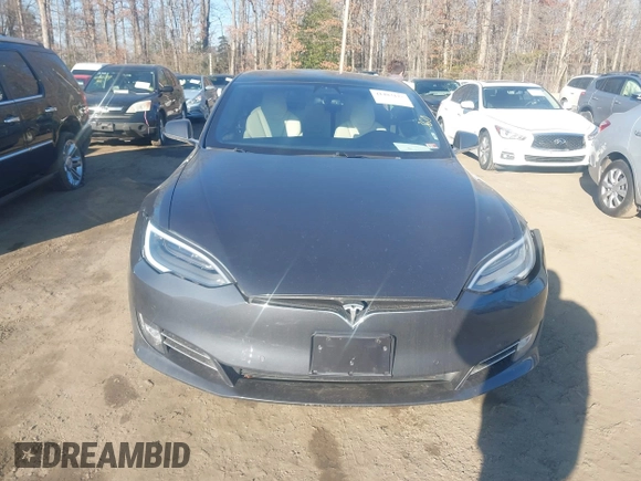2019 Tesla Model S 75D with VIN 5YJSA1E2XKF331744, listed as a IAAI auction lot 41483173 with Not provided miles and . Bid and sale history available at DreamBid. Image 12.