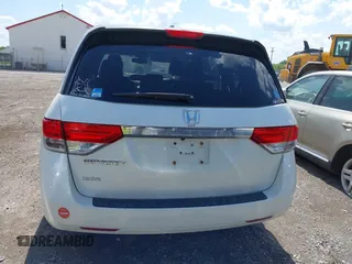 2014 Honda Odyssey EX-L with VIN 5FNRL5H69EB048867, listed as a IAAI auction lot 42190464 with 172,487 mi miles and . Bid and sale history available at carsss.com. Image 16.