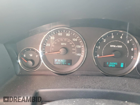 2006 Jeep Commander with VIN 1J8HH48KX6C203308, listed as a Copart auction lot 64456765 with 185,794 mi miles and Salvage title. Bid and sale history available at DreamBid. Image 9.